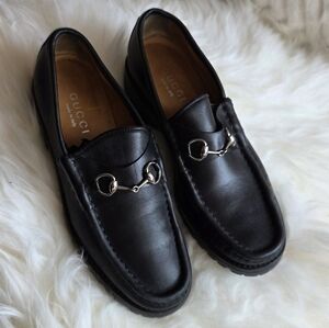Gucci  Black Leather Slip-On Loafers with Silver Accents